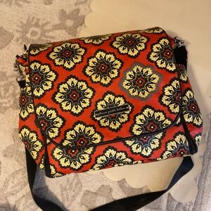 Petunia Pickle Bottom Red and Yellow Baby Bag with Retro Floral Design